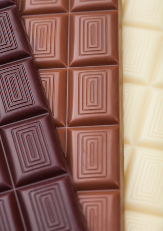 ars of white and milk and dark bitter chocolate macroの写真素材