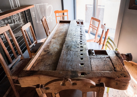 Interior of modern european beer bar pub with old vintage retro wooden furniture and style.