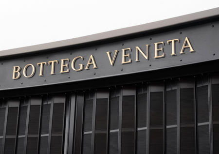 LONDON, UK - AUGUST 31, 2018: Botega Veneta logo on display in luxury fashion store.のeditorial素材