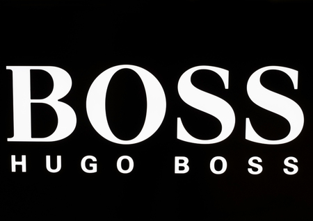 LONDON, UK - AUGUST 31, 2018: Hugo boss logo on display in luxury fashion store.のeditorial素材