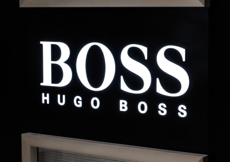 LONDON, UK - AUGUST 31, 2018: Hugo boss logo on display in luxury fashion store.のeditorial素材