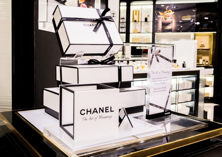 LONDON, UK - AUGUST 31, 2018: Chanel perfume and cosmetic makeup luxury collection in boutique store. Elegant shop.のeditorial素材