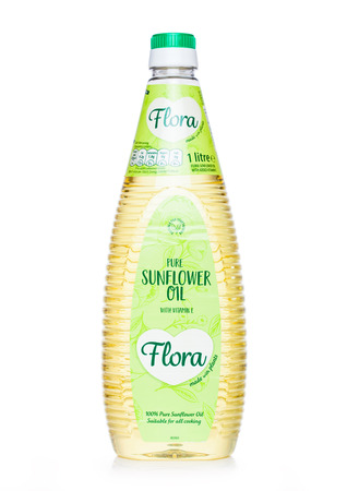LONDON, UK - NOVEMBER 01, 2018: Plastic bottle of Flora pure sunflower oil with vitamin E on whiteのeditorial素材