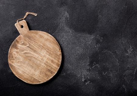 Vintage wooden cutting board. Kitchen cooking concept. Space for textの写真素材