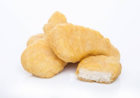 Buttered chicken nuggets kids fast food meals on white.の写真素材