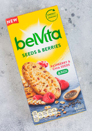 LONDON, UK - APRIL 01, 2020: Box of Belvita biscuits with seeds and berries and 5 whole grains on...