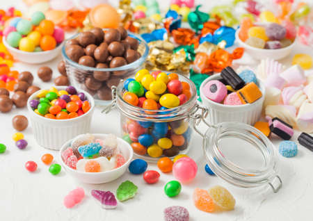 Milk chocolate candies in shell with jelly sugar gums and liquorice allsorts and fruit sherbet...