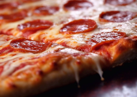 Large slice of tasty pepperoni pizza on table.AI Generativeの素材