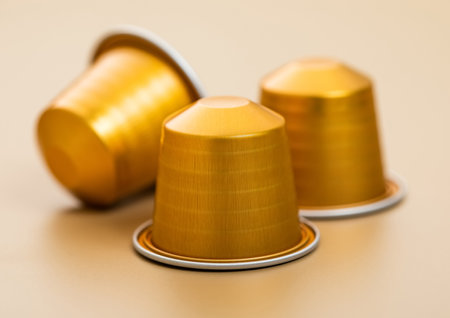 Coffee capsules pods for coffee machine on beige background.Macroの写真素材