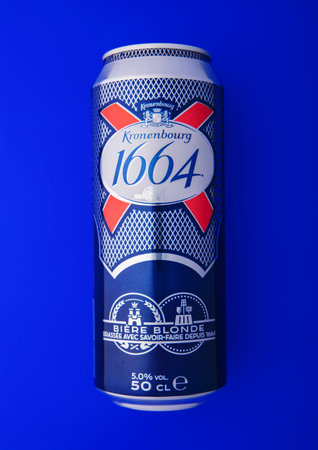 LONDON,UK - NOVEMBER 10,2025: 1664 Kronenbourg original beer in aluminium can on blue.のeditorial素材