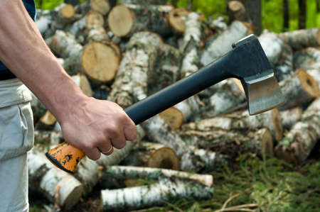 Round old timbers ready to go in processingの写真素材