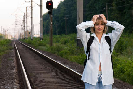 The beautiful young woman, was late for a trainの写真素材