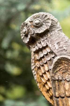 Big old wooden owl statueの写真素材