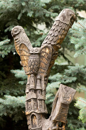 Big old wooden owl statueの写真素材