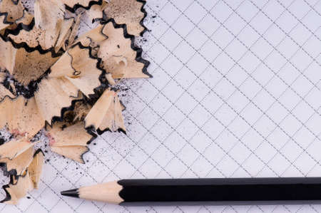 The black pencil and wood shavings backgroundの写真素材