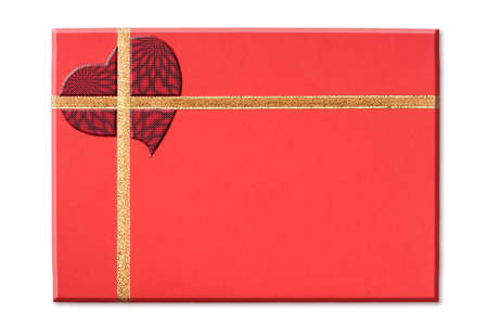 Red blank note and golden ribbon isolated on white background for Valentine's Dayの写真素材
