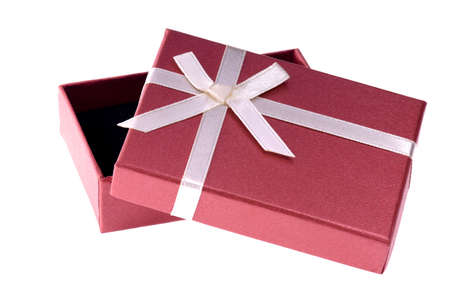 One red gift box with white ribbon and bow and isolatedの写真素材