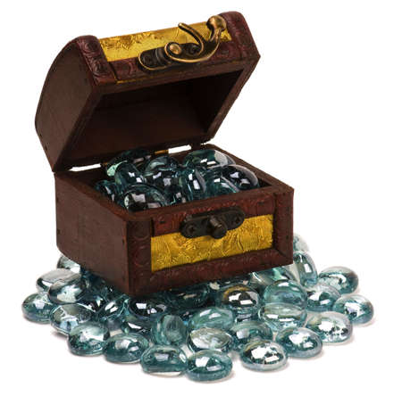 Wooden treasure chest with glass stones, isolated over white backgroundの写真素材