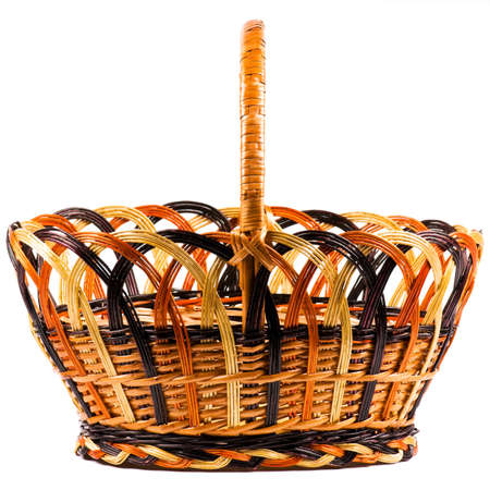 Traditional wicker basket isolated on white backgroundの写真素材