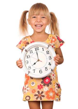 Girl holding big clock isolated on white backgroundの写真素材