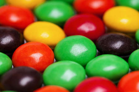 Background of colorful candies coated chocolate sweetsの写真素材
