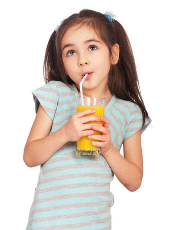Portrait of happy little girl drinking orange juice Portrait of happy little girl drinking orange juice