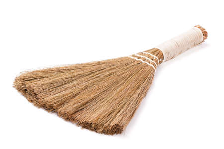 Close up of new broom on white background.の写真素材