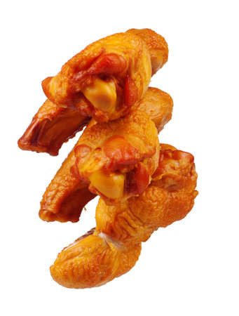 Delicious smoked chicken wings on a white backgroundの写真素材