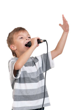 Little boy with microphone - isolated on white backgroundの写真素材