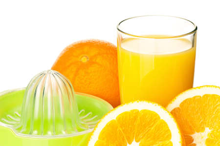 Glass of fresh orange juice, juicer and orange fruits on white background