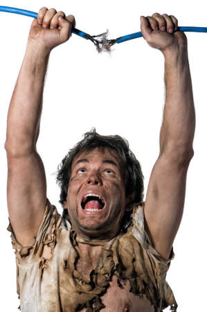 Portrait of crazy electrician over white backgroundの写真素材