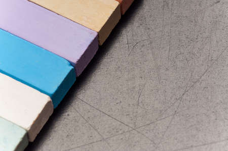 Empty blank black chalkboard with colorful chalkの写真素材
