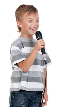 Little boy with microphone - isolated on white backgroundの写真素材