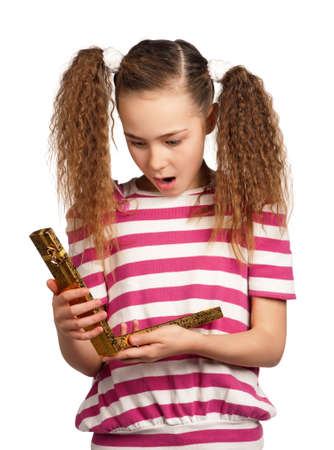Portrait of surprised girl with gift box isolated on white backgroundの写真素材