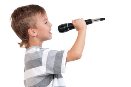 Little boy with microphone - isolated on white backgroundの写真素材