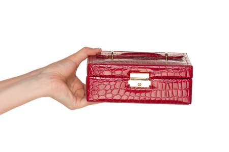 Woman hand with red box isolated on white backgroundの写真素材
