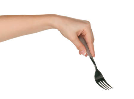 Woman hand with fork isolated on white backgroundの写真素材