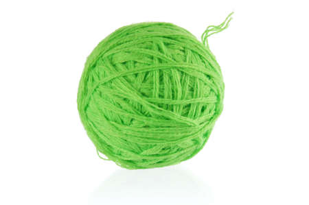 Green ball of yarn for knitting isolated on white backgroundの写真素材
