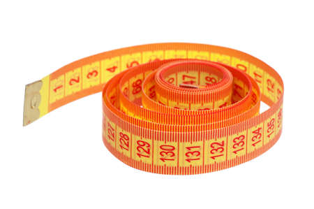 Measuring tape of the tailor over white backgroundの写真素材