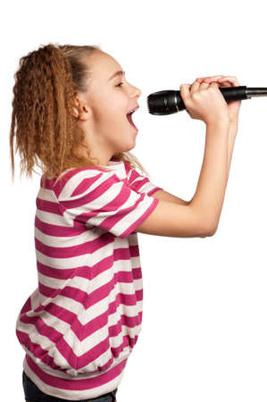 Portrait of girl singing with microphone isolated on white backgroundの写真素材