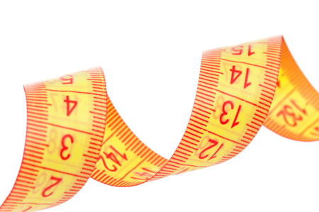 Measuring tape of the tailor over white background