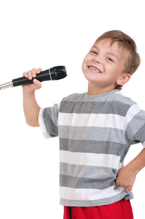 Little boy with microphone - isolated on white backgroundの写真素材
