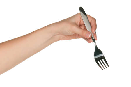 Woman hand with fork isolated on white backgroundの写真素材
