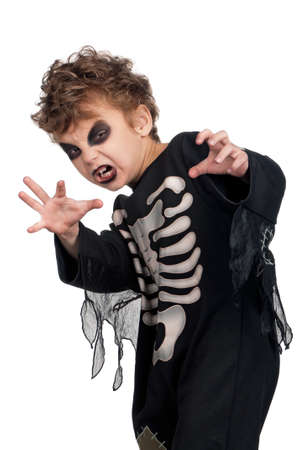 Portrait of little boy wearing halloween costume on white backgroundの写真素材