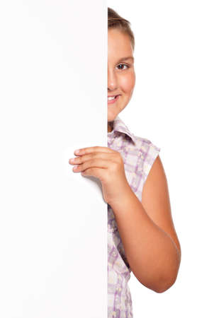 Portrait of happy girl with white blank isolated on white backgroundの写真素材