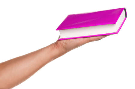 Man holding a book isolated on white backgroundの写真素材