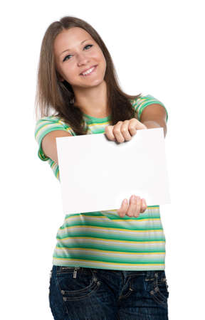 Beautiful teen girl with white blank isolated on white backgroundの写真素材
