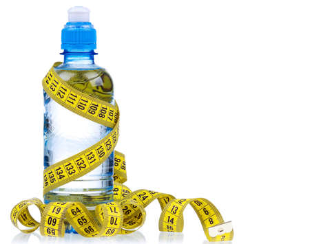 Bottled water for healthy life over a white backgroundの写真素材