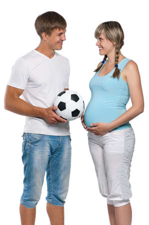 Portrait of a happy young pregnant woman with her husbandの写真素材