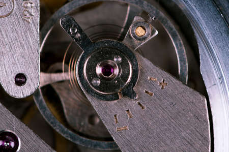 Close-up of mechanism of old watch  Photo macro の写真素材